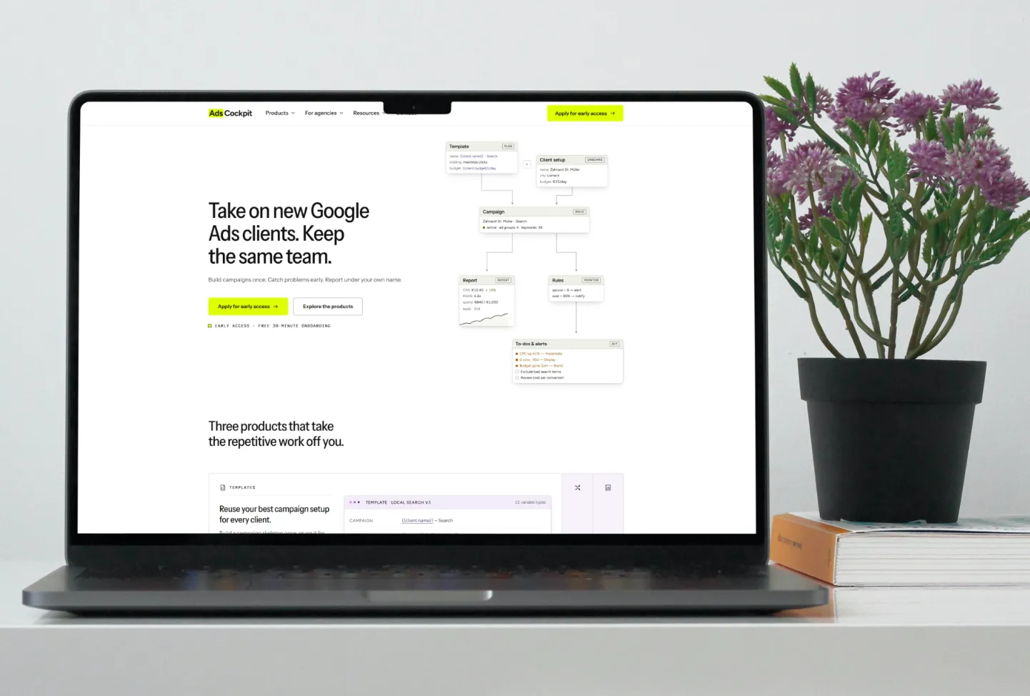 The AdsCockpit homepage, shown on a laptop.